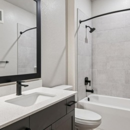 a bathroom with a sink and a bathtub