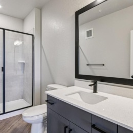 a bathroom with a glass shower